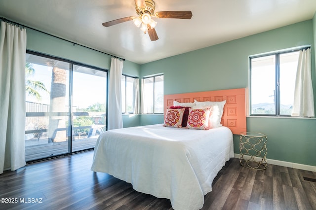 1115 W Santo Domingo Cir, Tucson, AZ 85704 - bedroom featuring multiple windows, access to exterior, and dark wood finished floors