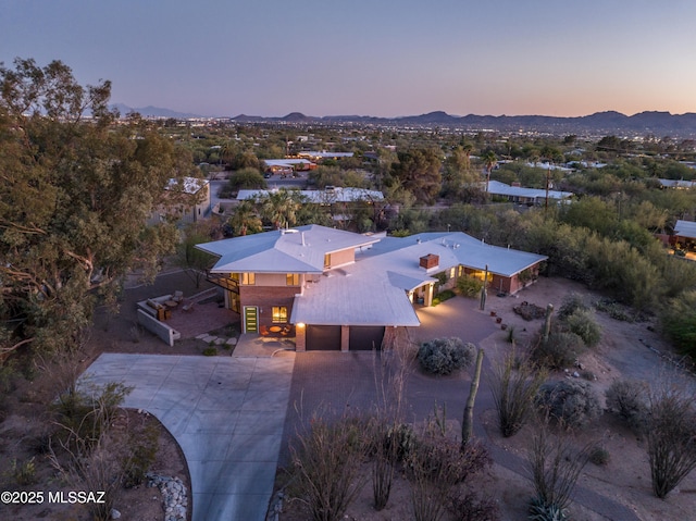 1115 W Santo Domingo Cir, Tucson, AZ 85704 - aerial view at dusk of a mountain view