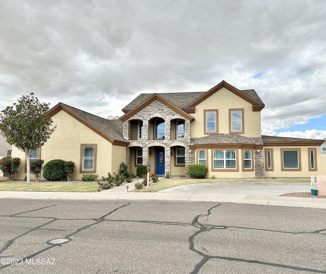 508 N Eagle Meadow Loop, Thatcher, AZ 85552 - view of front of house featuring stone siding and stucco siding