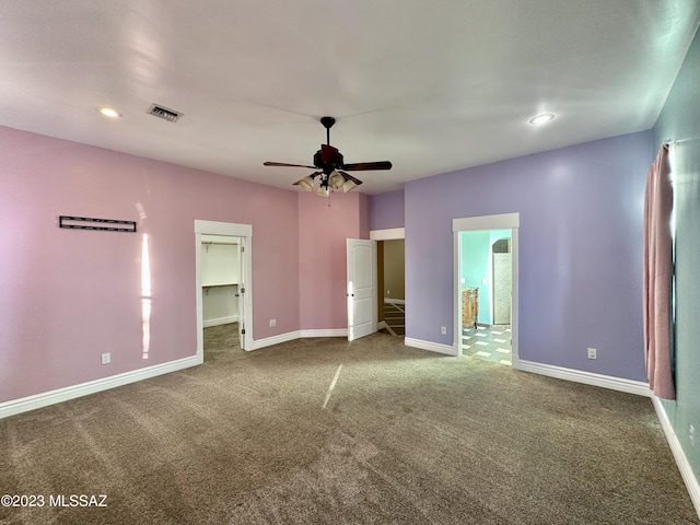 508 N Eagle Meadow Loop, Thatcher, AZ 85552 - unfurnished bedroom with carpet floors, a spacious closet, recessed lighting, a ceiling fan, and connected bathroom