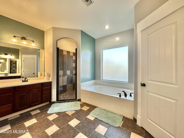 508 N Eagle Meadow Loop, Thatcher, AZ 85552 - bathroom featuring a garden tub, vanity, and a stall shower