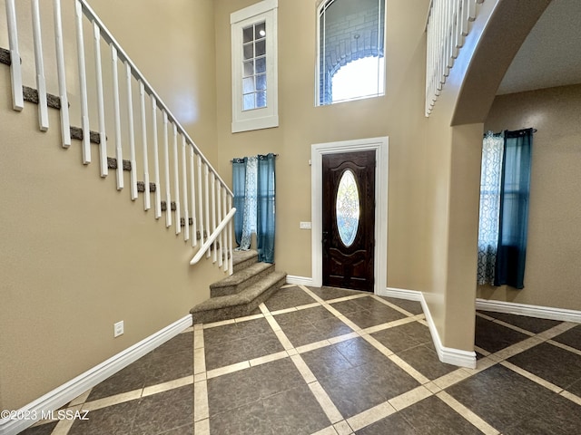 508 N Eagle Meadow Loop, Thatcher, AZ 85552 - entryway with a high ceiling, stairway, and inlaid floor details
