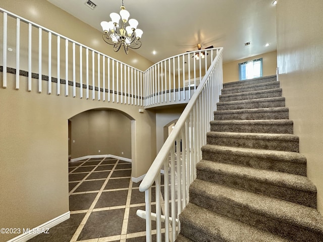 508 N Eagle Meadow Loop, Thatcher, AZ 85552 - stairway featuring arched walkways, recessed lighting, carpet floors, a chandelier, and a towering ceiling