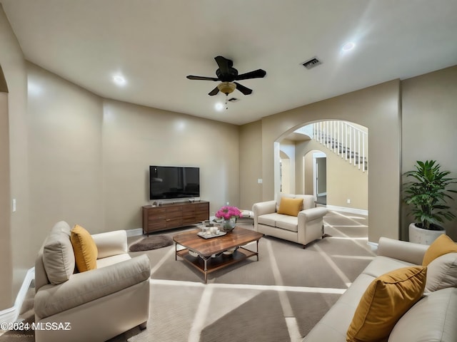508 N Eagle Meadow Loop, Thatcher, AZ 85552 - living room with arched walkways, a ceiling fan, carpet flooring, and recessed lighting