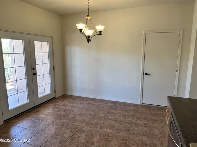 3365 N River Rapids Dr, Tucson, AZ 85712 - unfurnished dining area featuring french doors, a chandelier, and healthy amount of natural light