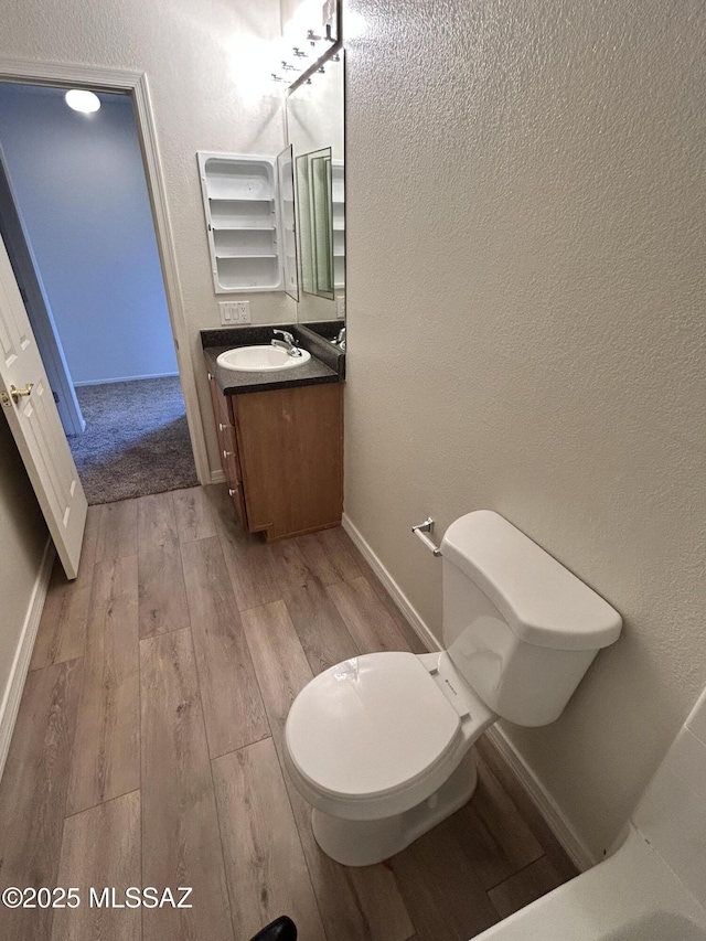 3365 N River Rapids Dr, Tucson, AZ 85712 - bathroom with wood finished floors and vanity