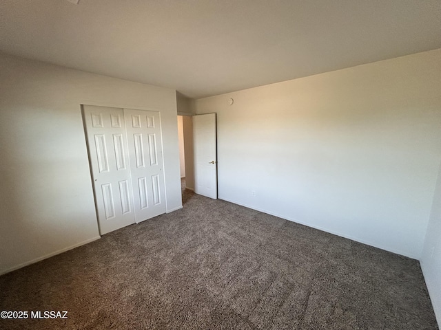 3365 N River Rapids Dr, Tucson, AZ 85712 - unfurnished bedroom featuring carpet and a closet