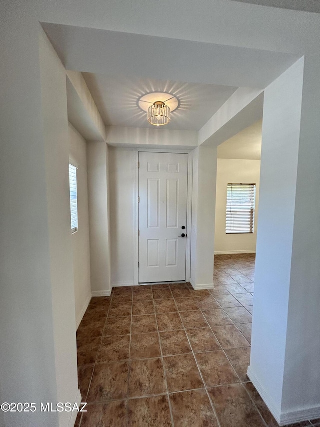 3365 N River Rapids Dr, Tucson, AZ 85712 - foyer entrance featuring baseboards