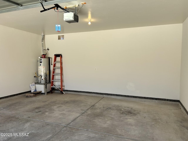 3365 N River Rapids Dr, Tucson, AZ 85712 - garage featuring gas water heater and a garage door opener