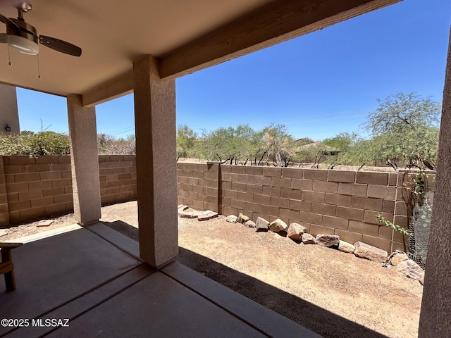 3365 N River Rapids Dr, Tucson, AZ 85712 - fenced backyard with a ceiling fan and a patio