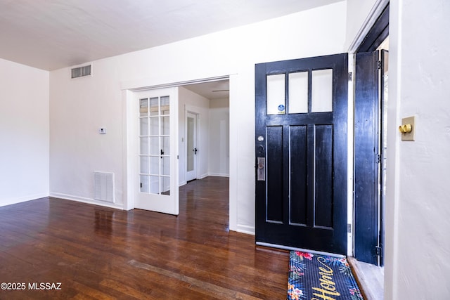 1809 E 8th St, Tucson, AZ 85719 - foyer entrance with wood finished floors and baseboards