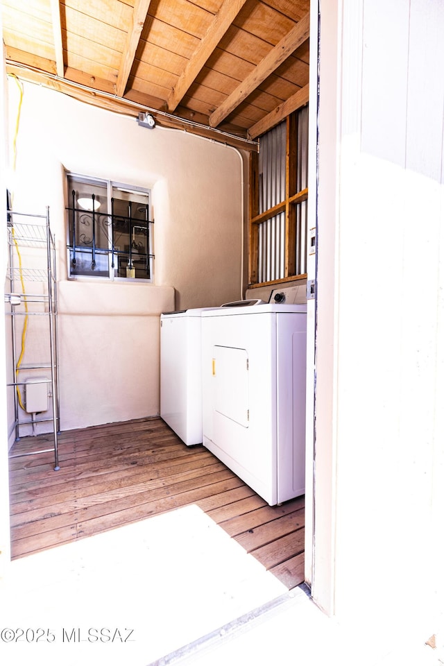 1809 E 8th St, Tucson, AZ 85719 - laundry area with washer and clothes dryer and wood finished floors