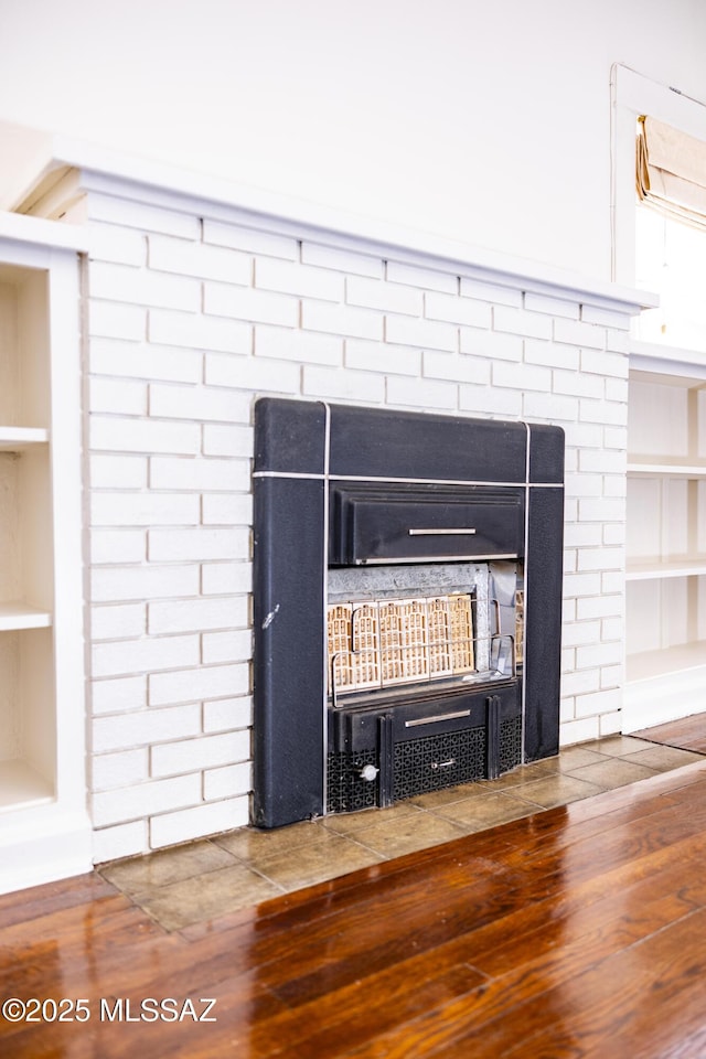 1809 E 8th St, Tucson, AZ 85719 - detailed view of built in shelves and wood finished floors