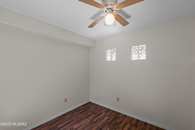1026 E Madera Estates Ln, Sahuarita, AZ 85629 - spare room featuring dark wood-type flooring and a ceiling fan