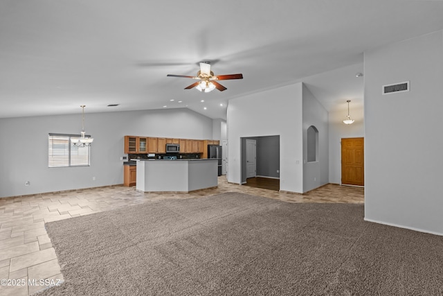 1026 E Madera Estates Ln, Sahuarita, AZ 85629 - unfurnished living room with ceiling fan, recessed lighting, arched walkways, a chandelier, and high vaulted ceiling