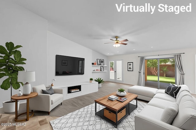 1026 E Madera Estates Ln, Sahuarita, AZ 85629 - living room featuring a ceiling fan, a fireplace, and vaulted ceiling