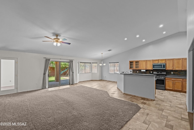 1026 E Madera Estates Ln, Sahuarita, AZ 85629 - kitchen featuring stainless steel appliances, open floor plan, dark countertops, ceiling fan, and glass insert cabinets