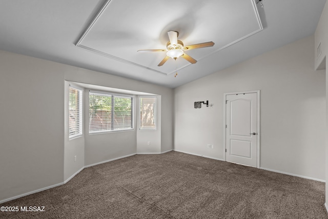 1026 E Madera Estates Ln, Sahuarita, AZ 85629 - empty room featuring attic access, a ceiling fan, carpet flooring, and vaulted ceiling