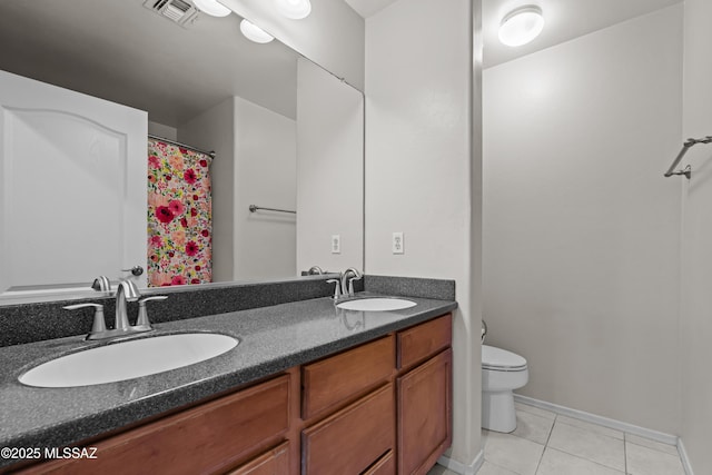 1026 E Madera Estates Ln, Sahuarita, AZ 85629 - bathroom with double vanity and tile patterned floors