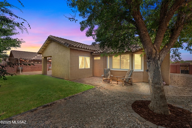 1026 E Madera Estates Ln, Sahuarita, AZ 85629 - rear view of property with stucco siding, a patio, and a tile roof