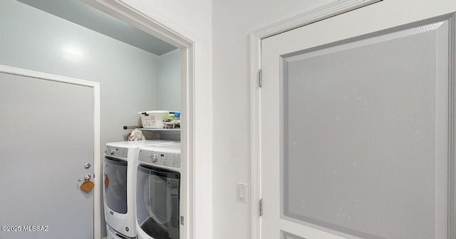 15769 S Via Cayetano, Sahuarita, AZ 85629 - washroom with washer and clothes dryer