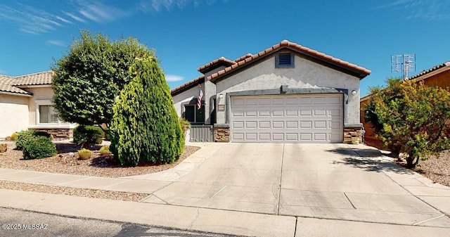 15769 S Via Cayetano, Sahuarita, AZ 85629 - mediterranean / spanish house featuring stucco siding, concrete driveway, an attached garage, and a tile roof