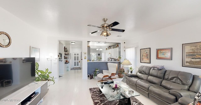 15769 S Via Cayetano, Sahuarita, AZ 85629 - living area featuring a ceiling fan and wood finished floors