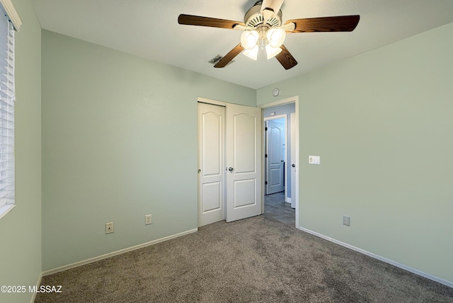 2898 W Simplicity Dr, Tucson, AZ 85741 - unfurnished bedroom with carpet, a closet, and ceiling fan