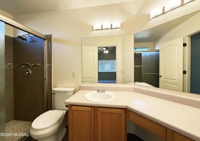2898 W Simplicity Dr, Tucson, AZ 85741 - full bath featuring vanity, a stall shower, ceiling fan, and a textured wall