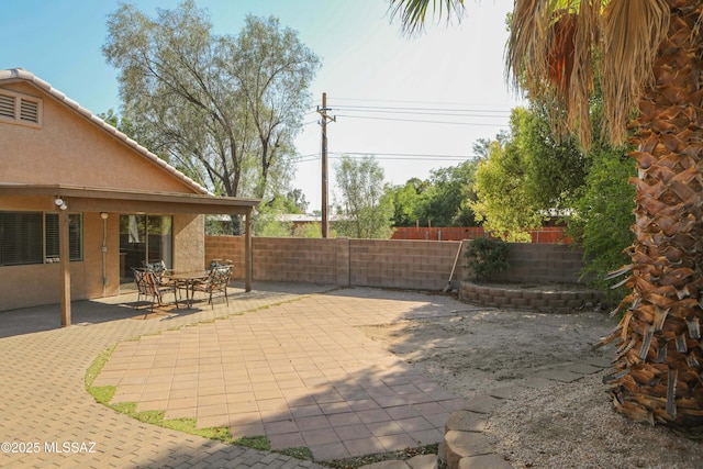2898 W Simplicity Dr, Tucson, AZ 85741 - fenced backyard featuring a patio