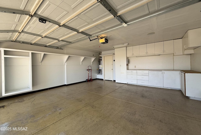 2898 W Simplicity Dr, Tucson, AZ 85741 - garage featuring a garage door opener