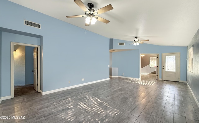 2898 W Simplicity Dr, Tucson, AZ 85741 - unfurnished living room with lofted ceiling, a ceiling fan, and wood finished floors