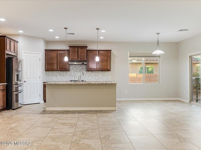 3872 W Sonoma Ranch Pl, Marana, AZ 85658 - kitchen featuring stainless steel fridge, plenty of natural light, backsplash, recessed lighting, and under cabinet range hood