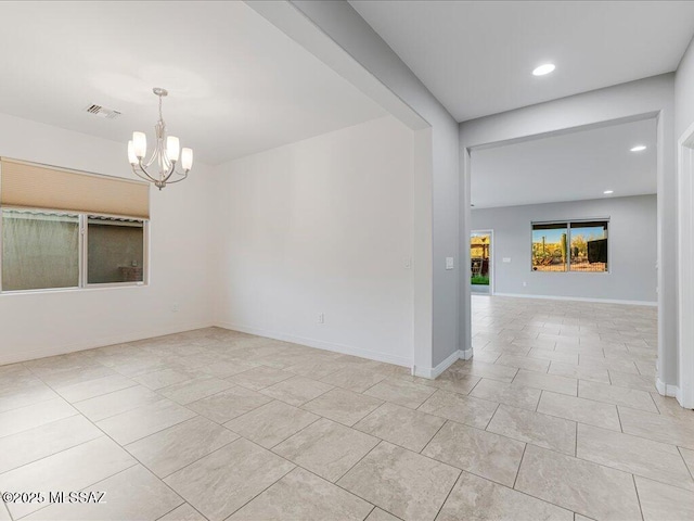 3872 W Sonoma Ranch Pl, Marana, AZ 85658 - spare room with a chandelier, light tile patterned flooring, and recessed lighting