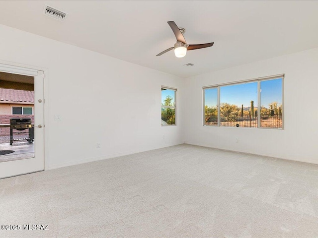 3872 W Sonoma Ranch Pl, Marana, AZ 85658 - carpeted spare room with a ceiling fan