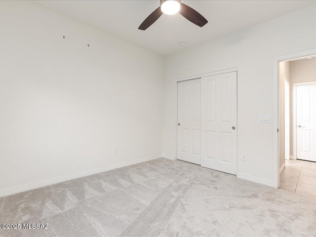 3872 W Sonoma Ranch Pl, Marana, AZ 85658 - unfurnished bedroom featuring carpet, a closet, and ceiling fan