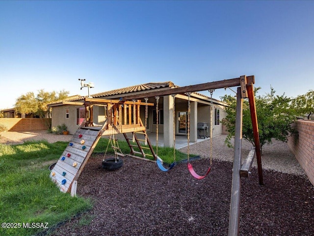 3872 W Sonoma Ranch Pl, Marana, AZ 85658 - view of play area featuring a patio and a fenced backyard
