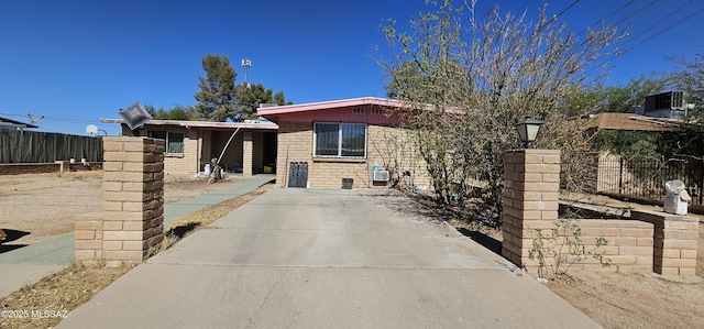 2009 S Longfellow Pl, Tucson, AZ 85711 - view of front of house featuring brick siding