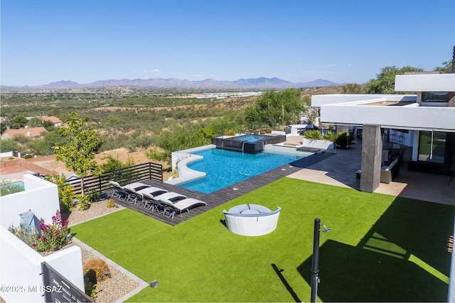 379 Camino A Las Casitas, Rio Rico, AZ 85648 - view of swimming pool with a mountain view, an in-ground hot tub, a patio, an infinity pool, and a fenced backyard