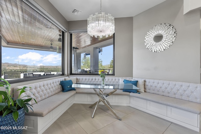 379 Camino A Las Casitas, Rio Rico, AZ 85648 - sunroom / solarium with a chandelier and plenty of natural light