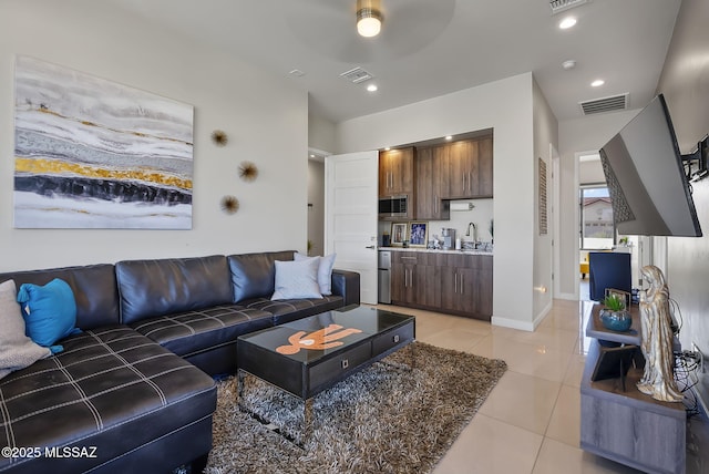 379 Camino A Las Casitas, Rio Rico, AZ 85648 - living area with light tile patterned floors, ceiling fan, and recessed lighting