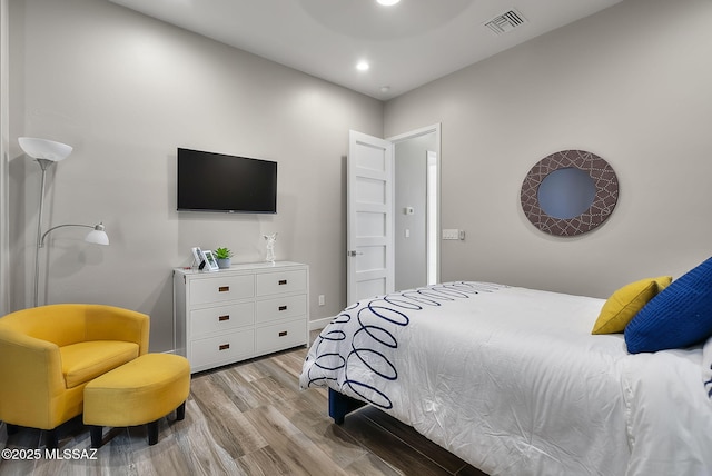379 Camino A Las Casitas, Rio Rico, AZ 85648 - bedroom with light wood finished floors and recessed lighting