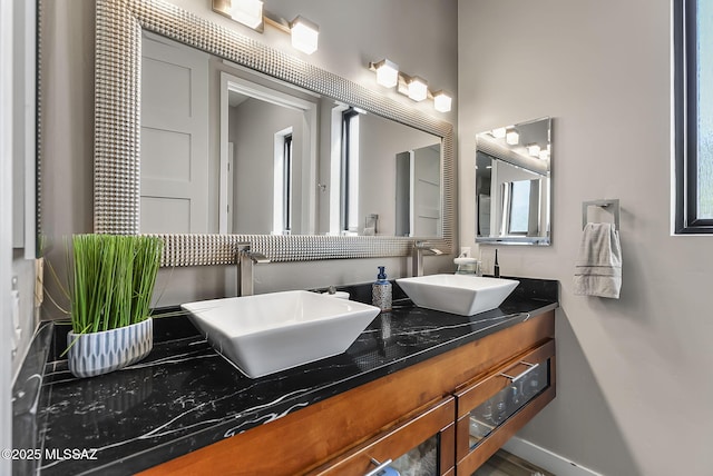 379 Camino A Las Casitas, Rio Rico, AZ 85648 - bathroom featuring double vanity and baseboards
