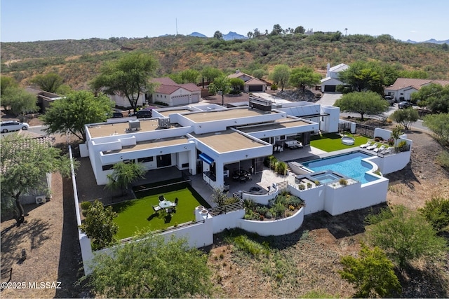 379 Camino A Las Casitas, Rio Rico, AZ 85648 - aerial perspective of suburban area with a pool and a mountainous background