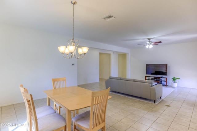 8348 N Mountain Stone Pine Way, Tucson, AZ 85743 - dining area featuring light tile patterned floors, a chandelier, and ceiling fan