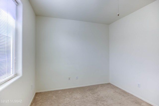 8348 N Mountain Stone Pine Way, Tucson, AZ 85743 - carpeted spare room featuring baseboards