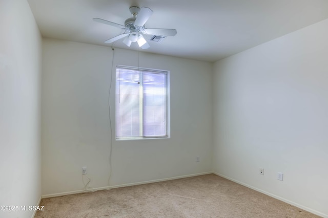 8348 N Mountain Stone Pine Way, Tucson, AZ 85743 - carpeted spare room with a ceiling fan and baseboards