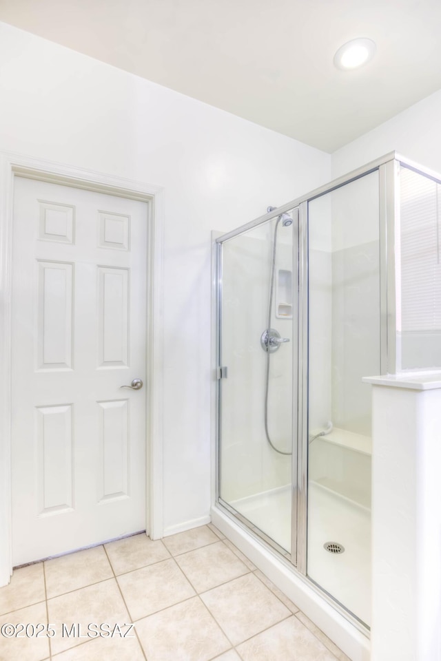 8348 N Mountain Stone Pine Way, Tucson, AZ 85743 - bathroom featuring a stall shower and tile patterned flooring