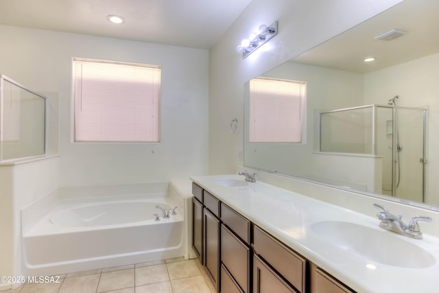8348 N Mountain Stone Pine Way, Tucson, AZ 85743 - bathroom with a garden tub, tile patterned floors, double vanity, and a shower stall