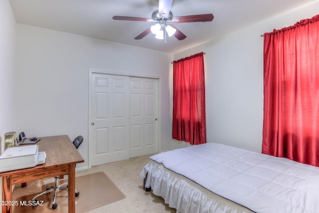 8348 N Mountain Stone Pine Way, Tucson, AZ 85743 - carpeted bedroom with a desk, a closet, and a ceiling fan
